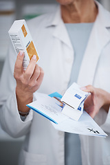 Image showing Pharmacy, pharmacist and hands with inhaler medicine, pills or box in drugstore or shop. Healthcare, wellness and medical doctor, female or woman holding medication or drugs, vitamins or supplements.