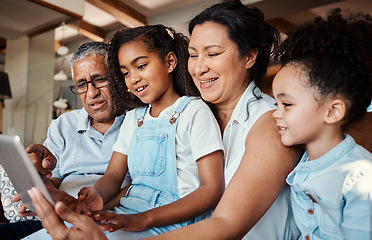 Image showing Family, relax and girl with tablet in home living room for social media, video streaming or web browsing. Technology, smile or care of happy grandfather, grandma and children bonding with touchscreen