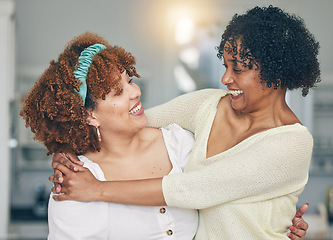 Image showing Hug, happy and a mother and daughter with admiration, love and laughing in the living room. Smile, affection and an African mom and woman hugging on mothers day during a visit or reunion together