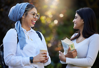 Image showing Happy, break or students laughing in park on university campus for learning, education or books together. Girls talk, Islamic or funny friends relaxing or meeting for research or college knowledge