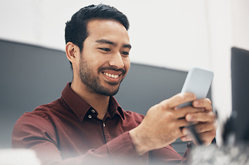 Image showing Phone, smile and businessman texting a social media message in an office online, internet or web laughing at meme. Funny, searching and corporate employee browsing website or mobile app on smartphone