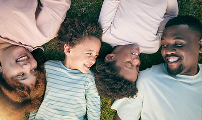 Image showing Smile, happy black family on grass from above mother, father and children lying together. Weekend, relax and people in garden, top view of woman, man and kids with happiness and love in South Africa.