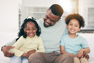 Image showing Love, happy and father on a sofa with his children embracing, relaxing and bonding in the family home. Happy, smile and portrait of kids sitting with their dad in the living room of their house.