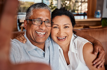 Image showing Portrait, selfie and laughing senior couple taking pictures in home for social media, happy memory or profile picture. Love, retirement smile and photography or photo of elderly man and woman.