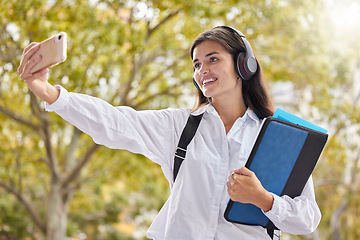 Image showing Student, woman and smile for selfie at university, outdoor and happy for social network ui, web or excited in summer. Young gen z girl, influencer and profile picture at campus with books in sunshine