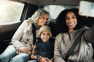 Image showing Selfie, smile and family on a road trip in a car for bonding, quality time and a getaway together. Happy, travel and mother, grandmother and a child taking a photo on vacation for social media