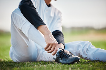 Image showing Baseball player, shoes and ankle pain, man with sport injury and emergency, first aid and need medical care outdoor. Accident, muscle tension and inflammation with male on sports field and fitness
