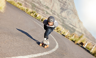 Image showing Skateboard, fitness and mountain with man in road for speed, freedom and summer break. Sports, adventure and wellness with guy skating fast in street for training, gen z and balance in nature