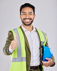 Image showing Portrait, civil engineering or happy man in studio with thumbs up, smile or real estate building success. Winning designer, architecture or contractor project management goals, agreement or like sign