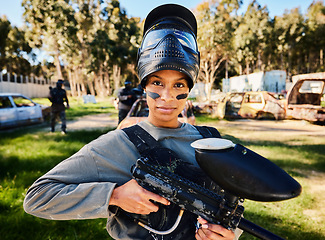 Image showing Paintball, serious or portrait of woman with gun in shooting game playing in action battlefield mission. War, hero or focused soldier with army weapons gear in survival military challenge competition