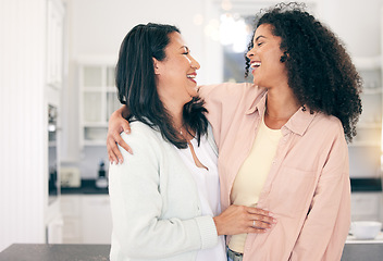 Image showing Love, mother and daughter hug, quality time and happiness for bonding, relax and cheerful. Family, mother and female adult child embrace, joyful and living together in home, smile and weekend break