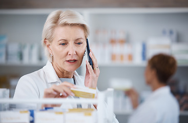 Image showing Pharmacy, pharmacist and woman on phone call with medicine or pills in store for telehealth. Healthcare, smartphone and senior medical doctor in consultation with contact for medication prescription.