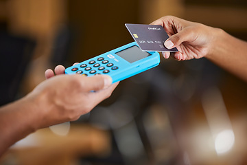 Image showing Hands, credit card and machine for ecommerce, payment or wireless transaction and purchase at retail store. Hand of customer paying, buying or tap to pay on electronic POS device for easy banking