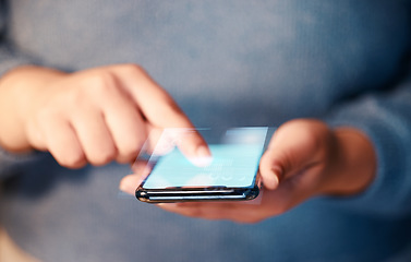 Image showing Hands typing, phone screen and hologram in office, data or holographic financial statistics. Futuristic, graphs or business woman with mobile smartphone for networking, web browsing or 3d digital app