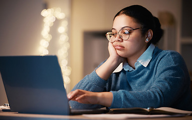 Image showing Laptop, bored student and woman in home for late night studying, knowledge research or elearning. Sad, depression and female with fatigue, boredom and burnout while on computer for education in house