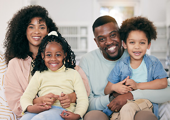 Image showing Happy, love and portrait of a black family in the living room sitting, relaxing and bonding together. Happiness, smile and young African man and woman resting with their children on a sofa at home.