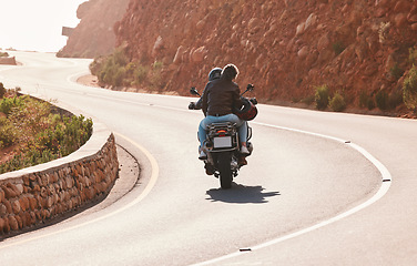 Image showing Motorcycle, travel and couple on mountain for adventure, freedom and enjoy road trip together on weekend. Love, traveling and back of man and woman ride on motorbike for holiday, vacation and journey