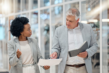 Image showing Bookkeeping, business people or team analysis of budget, financial paperwork or invoice information check of manager. Boss, mentor and black woman or accountant talking of finance or documents advice