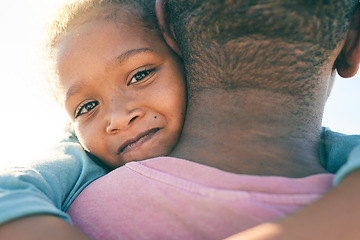 Image showing Face portrait, child or black family hug, embrace or bond on outdoor vacation for peace, freedom and quality time. Sunshine flare, love or African youth kid, father or people together in South Africa