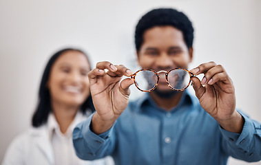 Image showing Medical, eye care and vision with black man and glasses for you for decision, retail and optometry. Choice, frames and ophthalmology with doctor and patient for consulting, shopping and healthcare