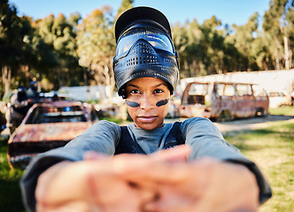 Image showing Paintball, portrait or woman stretching hands in military training game on battlefield to warm up. Fitness, flexible girl or face of female soldier in army survival challenge competition or workout