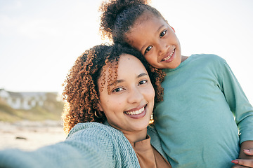 Image showing Selfie, smile and portrait of mother and girl by beach for bonding, relax and hug for quality time together. Summer, happy family and mom and child take picture by sea on holiday, vacation or weekend