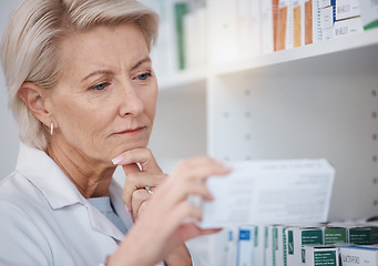 Image showing Pharmacy, pharmacist and woman reading medicine label, pills or box in drugstore. Healthcare, thinking and elderly medical doctor looking at medication, antibiotics or drugs, vitamins or supplements.