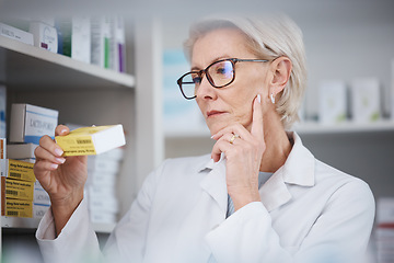 Image showing Pharmacy, pharmacist and woman reading medication label, pills or box in drugstore. Healthcare, wellness and elderly medical doctor looking at medicine, antibiotics or drugs, vitamins or supplements.
