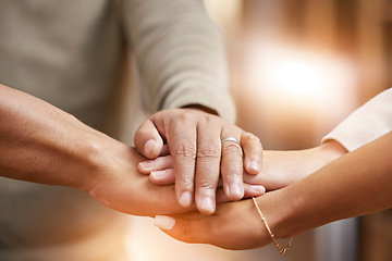 Image showing Business people, hands together and unity in support, trust or teamwork collaboration at office. Group piling hand in team building for goal, motivation or success in union partnership or cooperation