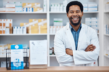 Image showing Pharmacy portrait, medicine package and happy man in drugs store, pharmaceutical shop or healthcare dispensary. Hospital retail product, stock pills and African pharmacist for medical help support