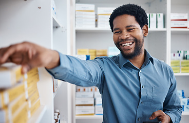 Image showing Pharmacy, happy and black man shopping for medicine box, customer supplements product or drugs store pharmaceutical. Retail hospital shop, clinic pills shelf and client for medical healthcare choice