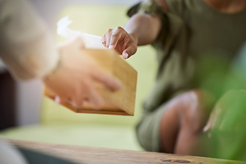 Image showing Therapist hand, tissue box and black woman at therapy consultation for grief and depression help. Mental support, healthcare appointment and sad female with trust and blurred background in a office