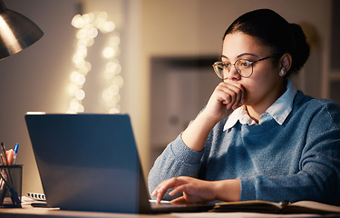 Image showing Business woman, laptop and thinking in home at night, working on project or research. Idea, reading or female professional, freelancer or remote worker on computer planning, contemplating or decision