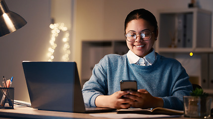 Image showing Woman, phone and student with laptop in home for elearning, project or studying at night. Bokeh, mobile and smile of happy business female, freelancer or remote worker with smartphone for research.