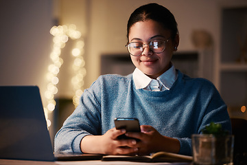 Image showing Business woman, phone and typing in home office for web browsing, texting or social media. Night bokeh, cellphone and happy female, freelancer or remote worker with mobile smartphone for research.