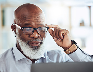 Image showing Black man, business glasses and reading laptop in corporate office, online news article and website. Mature manager, computer technology and earphones for video call, virtual working and management