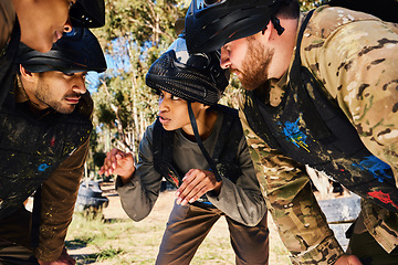 Image showing Mission, paintball or team in huddle planning strategy goals, or soldier training on war battlefield. People, community or army soldiers talking for support, collaboration or military group together