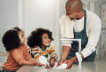 Image showing Cleaning, help and happy with black family in kitchen for bonding, hygiene or teaching. Smile, support and natural with father and children at home for sanitary, responsibility or housekeeping chores