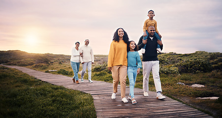 Image showing Black family, walking or sunset with parents, children and grandparents spending time together in nature. Spring, love or environment with kids and senior relatives taking a walk while bonding