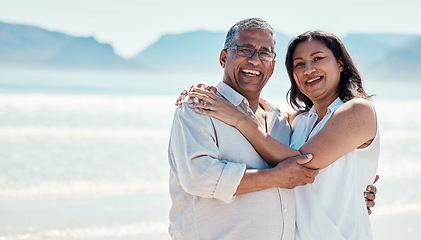 Image showing Love, portrait and old couple hug on beach, embrace and romance in happy relationship and mockup. Romantic retirement vacation, senior woman and man hugging on ocean holiday travel with smile on face