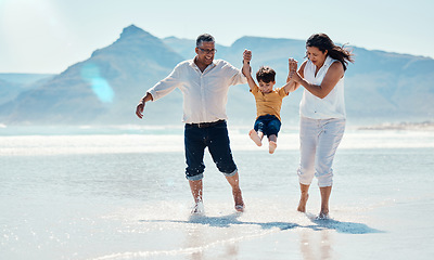 Image showing Family, beach and grandparents with child for playing, quality time and adventure together. Travel, happy and grandfather, grandma and boy bonding on summer holiday, fun vacation and relax on weekend