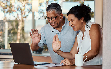 Image showing Laptop, wave and senior couple on video call in home, laughing and talking to contact. Technology, computer and happy, elderly and retired man and woman waving in virtual or online chat for greeting.