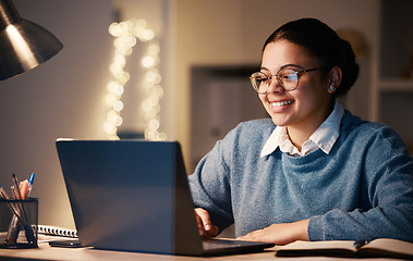 Image showing Business, student or laptop in night home office on financial software, investment data or savings growth analytics. Smile, happy or working late woman on technology for finance learning or education