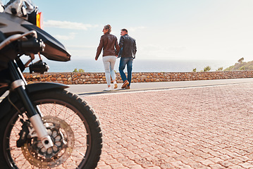 Image showing Back, view and a biker couple on a road trip together in summer during retirement. Motorcycle, freedom or travel with a senior man and woman traveling along the coast while bonding on vacation