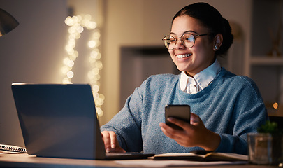 Image showing Woman, phone and student with laptop in home for web browsing, project or studying at night. Bokeh, mobile and smile of happy business female, freelancer or remote worker with computer for research.