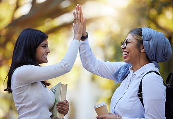 Image showing High five, young women outdoor and friends with support, solidarity and happiness on college campus. Team agreement, happy female and success in class project, celebrate win and positive feedback