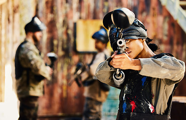 Image showing Paintball, target training or woman with gun in shooting game playing with on fun battlefield mission. Aim, hero or focused soldier with army weapons gear in survival military challenge competition