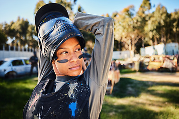 Image showing Paintball, girl or woman stretching in training or game playing on battlefield or playground to warm up. Fitness or flexible female soldier with army gear in survival military challenge competition