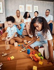 Image showing Family, happy and children playing with blocks for education, learning and curiosity. Living room, playful and kids with toys for mental development, childhood and hobby with parents and grandparents