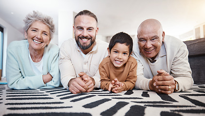 Image showing Happy, portrait and family on the floor for bonding, playing and quality time. Smile, happiness and father, child and grandparents lying on the living room during a visit together in a house